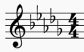 Musikalische Notenstaffel mit einem Vorzeichen von vier Bemol-Kreuzen und Taktart 4/4.