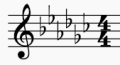 Musikalische Notenfolge mit flachen Tonzeichen auf einem Notensystem.