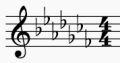 Musiknotation auf einem Violinschlüssel mit mehreren Noten, die alle ein flaches Vorzeichen (b) tragen.